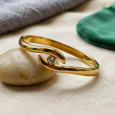 Golden Embrace Eye Knot Bangle