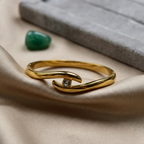 Golden Embrace Eye Knot Bangle
