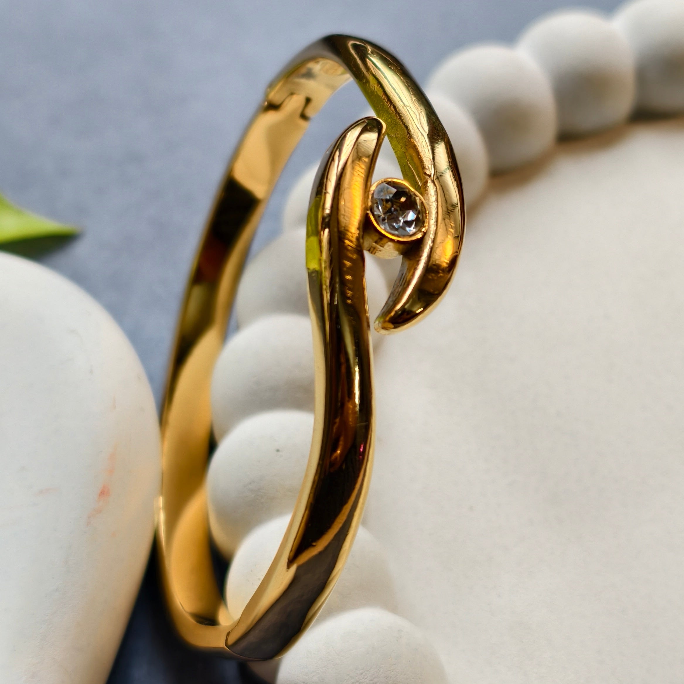 Golden Embrace Eye Knot Bangle