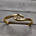 Golden Embrace Eye Knot Bangle