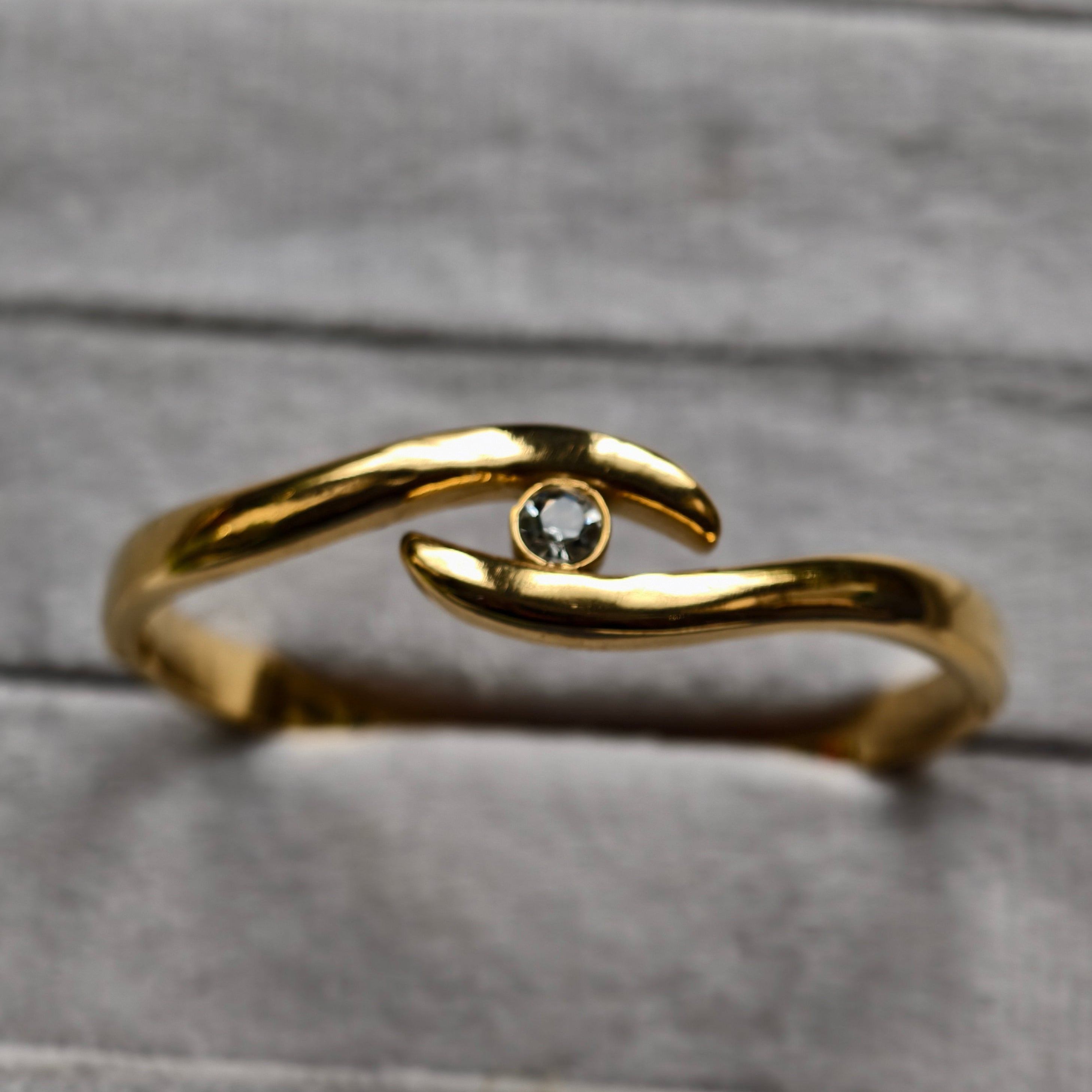 Golden Embrace Eye Knot Bangle