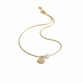 Solara Pearl Sunburst Pendant Necklace