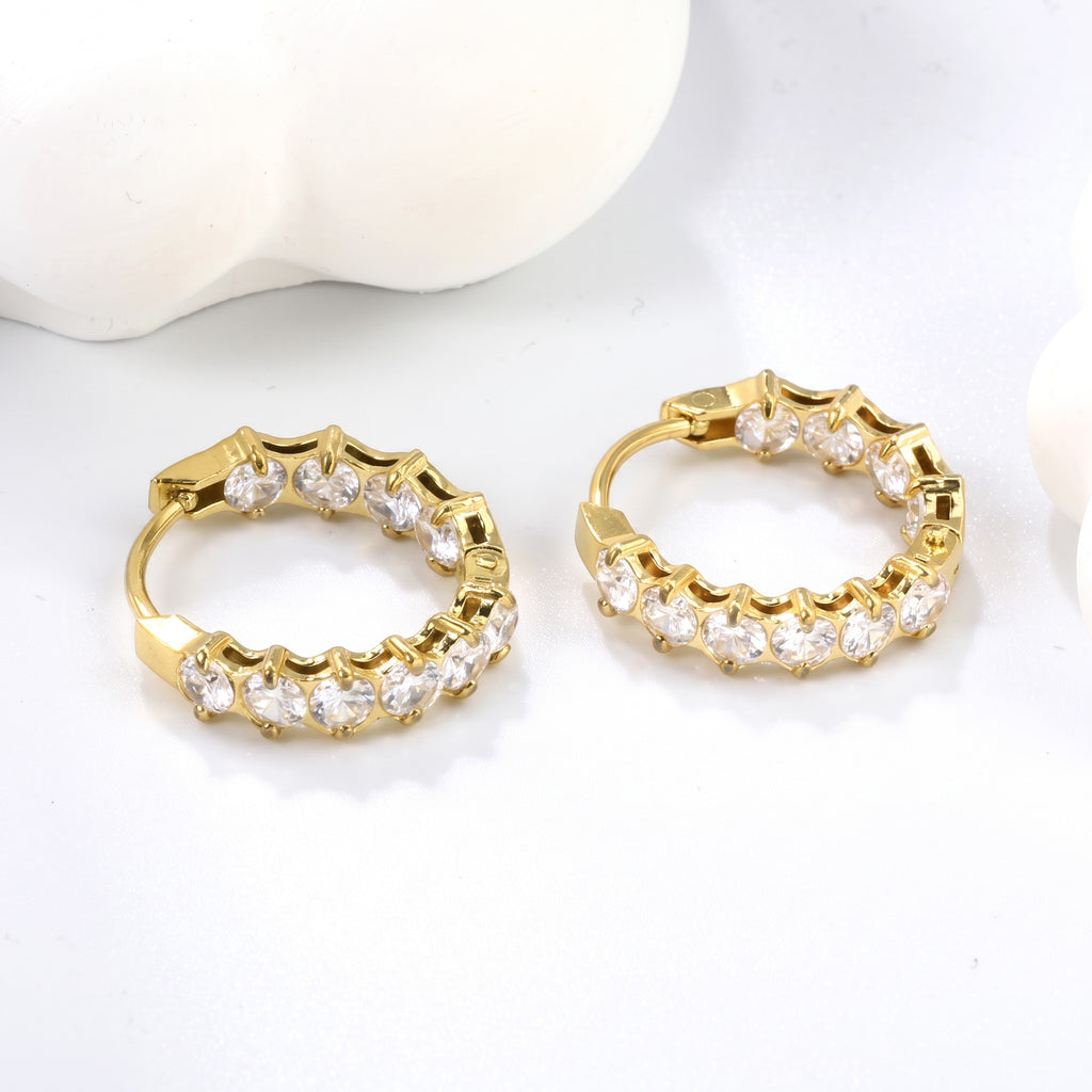 Pretty Shimmering Things Global Lyra crystal hoop clips in 18K gold-plated stainless steel with zircon stones.