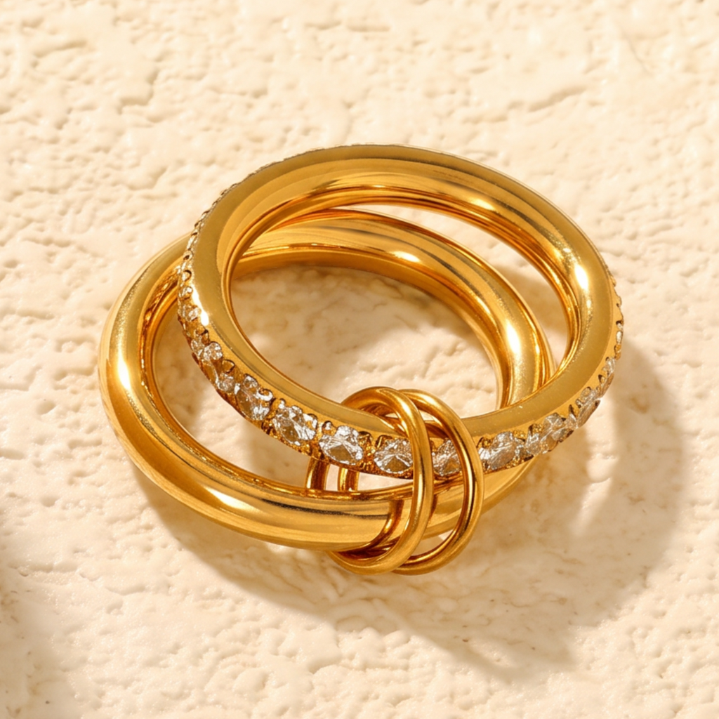 Pretty Shimmering Things Global Sloane double ring in 18K gold plated stainless steel with diamond accents.