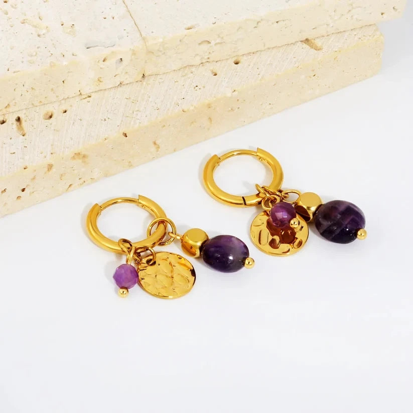 Pretty Shimmering Things Global Orchid Charm Hoop Clips featuring 18K gold plated hoops with purple amethyst charms.