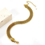 Pretty Shimmering Things Global gold-tone multi-strand woven stainless steel chain bracelet with lobster claw clasp
