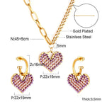 Pretty Shimmering Things Global Chloe heart charm necklace and earring set in gold-plated stainless steel with purple