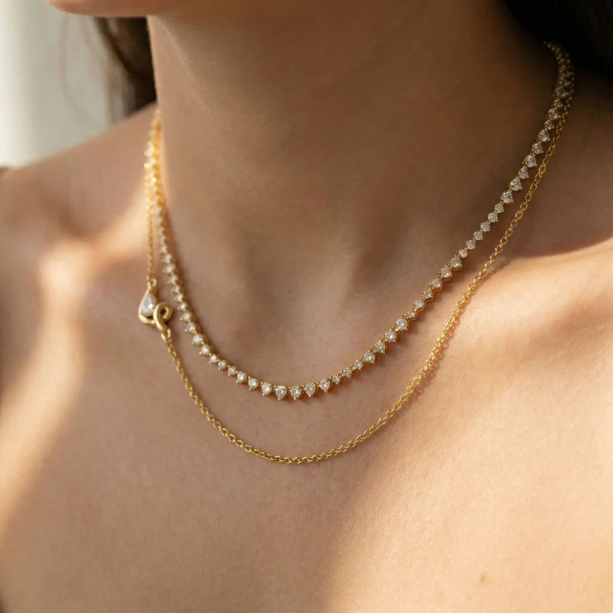 Pretty Shimmering Things Global layered gold-tone necklace set with a crystal-encrusted strand and sculptural clasp.