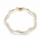 Pretty Shimmering Things Global twisted pearl bracelet with white pearls and gold-tone wire featuring a magnetic clasp