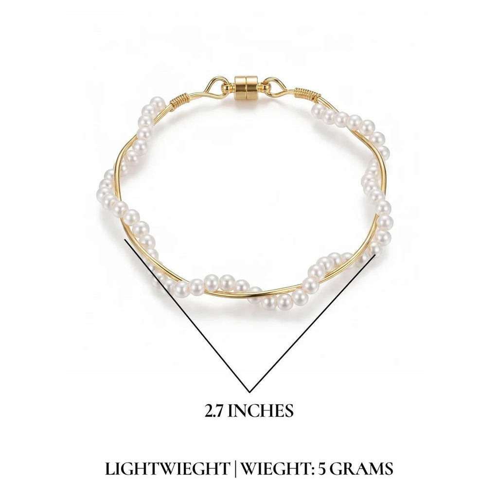 Pretty Shimmering Things Global twisted pearl bracelet with gold-tone wire and magnetic clasp, 2.7 inches in diameter.