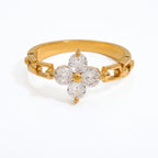 Pretty Shimmering Things gold-tone floral ring with clear cubic zirconia petals and a unique chain-link band design.
