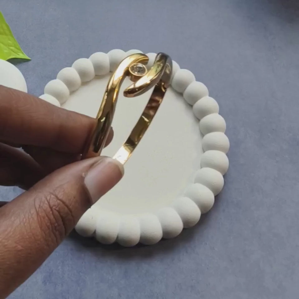 Golden Embrace Eye Knot Bangle